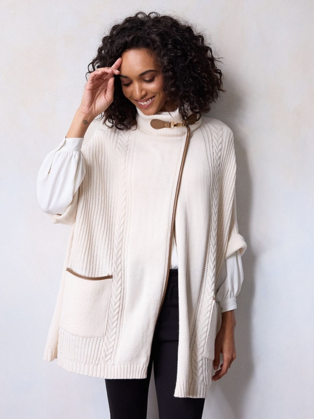 LC Lauren Conrad cream cable-knit cape diagonal zip and contrast brown trim
